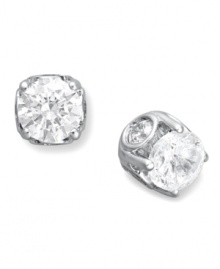 Traditional diamond stud earrings with an intricate twist. Each pair features a bezel-set diamond in the side, as well as a round-cut diamond at front (total 1/2 ct. t.w.). Set in 14k white gold. Approximate diameter: 4-1/10 mm. Traditional diamond stud earrings with an intricate twist. Each pair features a bezel-set diamond in the side, as well as a round-cut diamond at front (total 1/2 ct. t.w.). Set in 14k white gold. Approximate diameter: 4-1/10 mm.