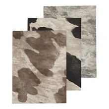 These bold, lively animal print placemats punch up any table setting. Choose from an embossed and printed all over pattern or spots. These bold, lively animal print placemats punch up any table setting. Choose from an embossed and printed all over pattern or spots.