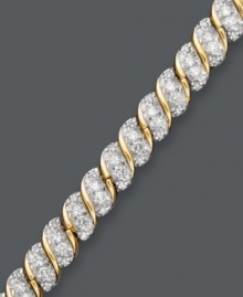 Twist and shine. This dazzling bracelet features a unique design that sparkles with the addition of round-cut diamonds (1-1/2 ct. t.w.). Crafted in 10k gold. Approximate length: 7-1/4 inches. Twist and shine. This dazzling bracelet features a unique design that sparkles with the addition of round-cut diamonds (1-1/2 ct. t.w.). Crafted in 10k gold. Approximate length: 7-1/4 inches.