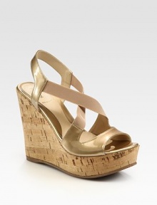 Patent leather and elastic straps weave their way across the foot, concluding with a slingback strap and natural cork wedge. Cork wedge, 5 (125mm)Cork platform, 1½ (40mm)Compares to a 3½ (90mm)Patent leather and elastic upperLeather liningRubber solePadded insoleMade in ItalyOUR FIT MODEL RECOMMENDS ordering true size. Patent leather and elastic straps weave their way across the foot, concluding with a slingback strap and natural cork wedge. Cork wedge, 5 (125mm)Cork platform, 1½ (40mm)Compares to a 3½ (90mm)Patent leather and elastic upperLeather liningRubber solePadded insoleMade in ItalyOUR FIT MODEL RECOMMENDS ordering true size.