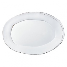 An effortless collection that transitions seamlessly from your kitchen to the table, these exceptional serving dishes solidify your presentation with down-to-earth elegance. Crafted in Tuscany from Italian stoneware, and featuring unique, rustic shapes with modern details, these pieces are built to last, both in terms of style and functionality. An effortless collection that transitions seamlessly from your kitchen to the table, these exceptional serving dishes solidify your presentation with down-to-earth elegance. Crafted in Tuscany from Italian stoneware, and featuring unique, rustic shapes with modern details, these pieces are built to last, both in terms of style and functionality.