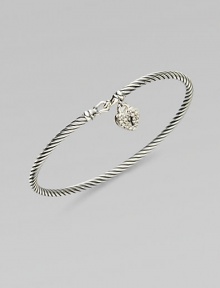 From the Cable Collectibles Collection. Signature sterling silver cable band is adorned with a delicate diamond heart lock for a memorable keepsake.Diamond, 0.14 tcw Sterling silver Width, about 3mm Hook closure Imported From the Cable Collectibles Collection. Signature sterling silver cable band is adorned with a delicate diamond heart lock for a memorable keepsake.Diamond, 0.14 tcw Sterling silver Width, about 3mm Hook closure Imported