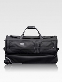 This roomy wheeled duffel is ideal for recreational and adventure travelers, whether traveling alone or as a pair. The durable ballistic nylon design features a separate bottom section perfect for gear, boots, shoes or clothing you want to keep separate. Zip closure Carry handles and telescoping handle Exterior zip pockets Interior organizing pockets FXT ballistic nylon 15½W X 29H X 14D Imported 