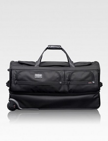 This roomy wheeled duffel is ideal for recreational and adventure travelers, whether traveling alone or as a pair. The durable ballistic nylon design features a separate bottom section perfect for gear, boots, shoes or clothing you want to keep separate. Zip closure Carry handles and telescoping handle Exterior zip pockets Interior organizing pockets FXT ballistic nylon 15½W X 29H X 14D Imported This roomy wheeled duffel is ideal for recreational and adventure travelers, whether traveling alone or as a pair. The durable ballistic nylon design features a separate bottom section perfect for gear, boots, shoes or clothing you want to keep separate. Zip closure Carry handles and telescoping handle Exterior zip pockets Interior organizing pockets FXT ballistic nylon 15½W X 29H X 14D Imported