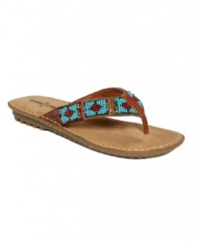 Bring easy Southwestern-inspired style to your summer looks with the colorful beading of the ultra-comfortable Marin thong sandals by Minnetonka. Bring easy Southwestern-inspired style to your summer looks with the colorful beading of the ultra-comfortable Marin thong sandals by Minnetonka.