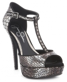 Thinly-lined t-straps are ultra-feminine, creating an elegant contrast that makes Jessica Simpson's Bansi platform sandals so very pretty. Thinly-lined t-straps are ultra-feminine, creating an elegant contrast that makes Jessica Simpson's Bansi platform sandals so very pretty.