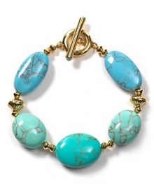 Dress up your summer whites with Lauren by Ralph Lauren's stunning turquoise stone bracelet. Dress up your summer whites with Lauren by Ralph Lauren's stunning turquoise stone bracelet.