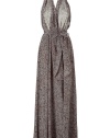 Sexy, simple dress in black patterned silk - Trendy floor-length maxi cut - Draped halter neckline with daring low back - Easy, fluid movement of flared skirt - Print in brown, black and cream, reminiscent of nature - Summer blockbuster dress pairs well with high wedged sandals