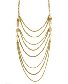 Take the layering trend to a whole new level. BCBGeneration's standout style features eight rows draped on top of one another for an ultra-chic look. Set in gold tone mixed metal. Approximate length: 16 inches. Approximate drop: 9-1/2 inches. Take the layering trend to a whole new level. BCBGeneration's standout style features eight rows draped on top of one another for an ultra-chic look. Set in gold tone mixed metal. Approximate length: 16 inches. Approximate drop: 9-1/2 inches.