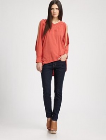 Comfy go-to has an attached hood, cutout sleeves and a dramatic hi-low hem. Attached hoodCrossover v-neckLong, open sleevesBanded cuffsHi-low hem55% hemp/45% organic cottonDry cleanImported of American fabricModel shown is 5'9 (175cm) wearing US size Small. Comfy go-to has an attached hood, cutout sleeves and a dramatic hi-low hem. Attached hoodCrossover v-neckLong, open sleevesBanded cuffsHi-low hem55% hemp/45% organic cottonDry cleanImported of American fabricModel shown is 5'9 (175cm) wearing US size Small.