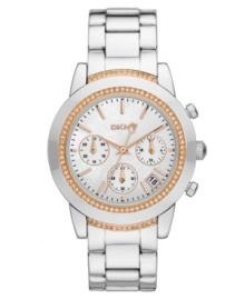 A classically styled boyfriend watch from DKNY, given the ladylike treatment with rosy accents. A classically styled boyfriend watch from DKNY, given the ladylike treatment with rosy accents.