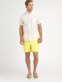 A vibrant summer essential, sport this garment dyed twill short with half-back elastic waist for added comfort.Flat-front styleSide slash, back welt pocketsInseam, about 6CottonMachine washMade in USA A vibrant summer essential, sport this garment dyed twill short with half-back elastic waist for added comfort.Flat-front styleSide slash, back welt pocketsInseam, about 6CottonMachine washMade in USA