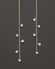 Faceted diamonds punctuate slim 14K yellow gold drops. By Meira T. Faceted diamonds punctuate slim 14K yellow gold drops. By Meira T.