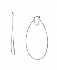 Take your look to the next level with bold, yet versatile, hoop earrings. This dramatic BCBGeneration style shimmers in silver tone mixed metal. Approximate diameter: 3 inches. Take your look to the next level with bold, yet versatile, hoop earrings. This dramatic BCBGeneration style shimmers in silver tone mixed metal. Approximate diameter: 3 inches.