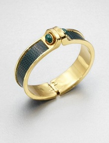 A goldtone cuff accented in luxurious lizard inlay with two malachite cabachons. MalachiteGoldtoneLizardDiameter, about 2.5Hinged closureMade in USA A goldtone cuff accented in luxurious lizard inlay with two malachite cabachons. MalachiteGoldtoneLizardDiameter, about 2.5Hinged closureMade in USA