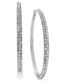 Go big and bold. These hoop earrings from Vince Camuto are crafted from silver tone mixed metal and feature rows of clear glass accents adorning the outside. Approximate drop: 3-1/4 inches. Go big and bold. These hoop earrings from Vince Camuto are crafted from silver tone mixed metal and feature rows of clear glass accents adorning the outside. Approximate drop: 3-1/4 inches.