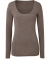 Effortlessly feminine, this super soft long sleeve tee from Majestic is a new-season must-have basic - Scooped neckline, long sleeves, stitched trim - Loosely fitted - Pair with printed skinny jeans, a boyfriend blazer, and ankle booties