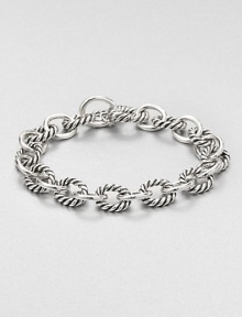 From the Chain Collection. Chunky oval links alternate between cable and smooth in this simple yet sophisticated style.Sterling silverLength, about 7.5Hidden spring clip claspMade in USA From the Chain Collection. Chunky oval links alternate between cable and smooth in this simple yet sophisticated style.Sterling silverLength, about 7.5Hidden spring clip claspMade in USA