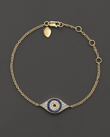 The traditional evil eye charm is lavishly updated with sparkling diamonds and blue, white and yellow sapphires. The traditional evil eye charm is lavishly updated with sparkling diamonds and blue, white and yellow sapphires.