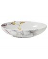 A natural at modern tables, the Aliza Gris oval vegetable bowl from Mikasa creates a serene landscape for casual dining. White porcelain with watercolor florals is sleek and elegant in form, but offers everyday durability.