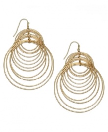 Spiral style. INC International Concepts comes full circle with this pair of hook earrings. Crafted from gold-tone mixed metal, the earrings offer a post-modern fashion touch. Approximate drop: 2-1/2 inches. Spiral style. INC International Concepts comes full circle with this pair of hook earrings. Crafted from gold-tone mixed metal, the earrings offer a post-modern fashion touch. Approximate drop: 2-1/2 inches.