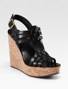 Feminine woven leather rests above a natural cork wedge.Cork heel, 5 (125mm) Cork platform, 1½ (40mm) Compares to a 3½ heel (90mm) Open toe Adjustable ankle strap Leather lining Rubber sole Imported Feminine woven leather rests above a natural cork wedge.Cork heel, 5 (125mm) Cork platform, 1½ (40mm) Compares to a 3½ heel (90mm) Open toe Adjustable ankle strap Leather lining Rubber sole Imported