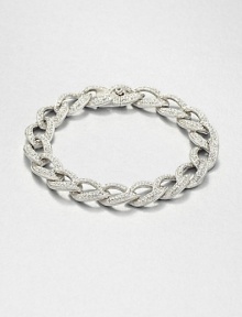 Tapered leaf-shaped links, encrusted with pavé crystals, form an elegantly simple chain bracelet with endless sparkle.CrystalRhodium platingLength, about 7¼Width, about ½Box-and-tongue claspImported Tapered leaf-shaped links, encrusted with pavé crystals, form an elegantly simple chain bracelet with endless sparkle.CrystalRhodium platingLength, about 7¼Width, about ½Box-and-tongue claspImported