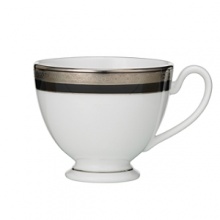 Intricately textured platinum rings on pure white china paired with the fashionably modern look of ebony creates a new sophistication for your table. Intricately textured platinum rings on pure white china paired with the fashionably modern look of ebony creates a new sophistication for your table.