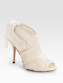 Fancy swirls of corded mesh adorn this glamorous peep-toe, with a grosgrain ribbon securing the ankle.Self-covered heel, 4 (100mm) Corded swirls on a mesh upper Grosgrain ribbon ankle straps Leather sole Made in Italy Fancy swirls of corded mesh adorn this glamorous peep-toe, with a grosgrain ribbon securing the ankle.Self-covered heel, 4 (100mm) Corded swirls on a mesh upper Grosgrain ribbon ankle straps Leather sole Made in Italy