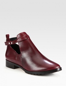 The ultimate downtown silhouette, impeccably tailored of supple leather and topped with shiny metal buttons. Stacked heel, 1¼ (30mm)Leather upperAnkle strap with metal button closuresLeather liningRubber solePadded insoleImported The ultimate downtown silhouette, impeccably tailored of supple leather and topped with shiny metal buttons. Stacked heel, 1¼ (30mm)Leather upperAnkle strap with metal button closuresLeather liningRubber solePadded insoleImported