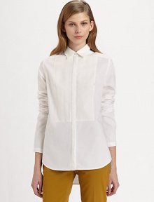 Classic button-down shirt renewed by a notched bib detail, hi-lo hem and silk trim. Point collarButton frontLong sleevesHi-lo hemBody: 95% cotton/5% polyurethane; Contrast: SilkDry cleanImportedModel shown is 5'10 (177cm) wearing US size 2. Classic button-down shirt renewed by a notched bib detail, hi-lo hem and silk trim. Point collarButton frontLong sleevesHi-lo hemBody: 95% cotton/5% polyurethane; Contrast: SilkDry cleanImportedModel shown is 5'10 (177cm) wearing US size 2.