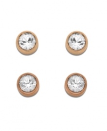 Double up on elegance and refinement. Swarovski's unique earring set includes two pairs of rose gold tone mixed metal pierced stud earrings. One pair sparkles in clear crystal while the other shimmers softly in Silk crystal. Approximate diameter: 1/2 inch. Double up on elegance and refinement. Swarovski's unique earring set includes two pairs of rose gold tone mixed metal pierced stud earrings. One pair sparkles in clear crystal while the other shimmers softly in Silk crystal. Approximate diameter: 1/2 inch.