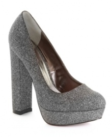 There's no resisting a click of the heels in these. The Daria platform pumps by Paris Hilton are covered in glitter and perfectly chunky. There's no resisting a click of the heels in these. The Daria platform pumps by Paris Hilton are covered in glitter and perfectly chunky.