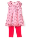 A flowy tunic with an allover print couples with cute leggings for an adorable, easy-breezy outfit.
