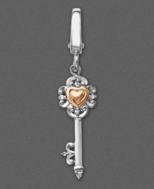 Keep the key to your heart close at hand with this Victorian-inspired sterling silver key charm featuring a 14k gold heart surrounded by shimmering diamond accents. Approximate drop: 1-1/2 inches. Keep the key to your heart close at hand with this Victorian-inspired sterling silver key charm featuring a 14k gold heart surrounded by shimmering diamond accents. Approximate drop: 1-1/2 inches.