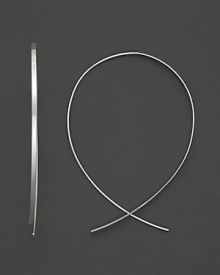 An inverted hoop earring in 14 Kt. white gold, with thread-through closure. Designed by Lana. An inverted hoop earring in 14 Kt. white gold, with thread-through closure. Designed by Lana.