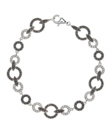 Wrap your wrists in chic, circular style. Judith Jack bracelet features glittering marcasite and crystals set in sterling silver. Approximate length: 7-1/4 inches. Wrap your wrists in chic, circular style. Judith Jack bracelet features glittering marcasite and crystals set in sterling silver. Approximate length: 7-1/4 inches.
