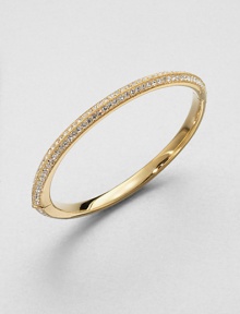 A sparkling, 18k goldplated piece with pavé crystals; perfect for stacking or on it's own. Crystals18k goldplatedDiameter, about 2.25Hinged, box and tongue closureImported A sparkling, 18k goldplated piece with pavé crystals; perfect for stacking or on it's own. Crystals18k goldplatedDiameter, about 2.25Hinged, box and tongue closureImported
