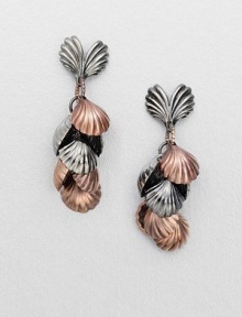 A whimsical drop of seashells in a two-tone design. Rose goldtone and hemetite-finishedDrop, about 2Post backImported 