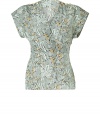 A subtle tropical print enlivens this incredibly chic silk top from Paul & Joe - V-neck, faux-wrap, short sleeves, buttons at shoulders, wide obi-like waistband, flared bottom, back self-tie waist belt - Wear with skinny jeans, cropped trousers, or a pencil skirt