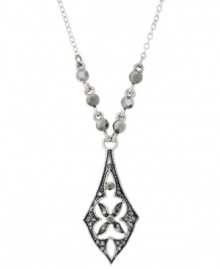 A striking silhouette. Diamonds are a girl's best friend, and this diamond-shaped pendant necklace from 2028 is no exception! Adorned with glittering glass accents, it's set in silver tone mixed metal. Approximate length: 16 inches + 3-inch extender. Approximate drop: 1-3/4 inches. A striking silhouette. Diamonds are a girl's best friend, and this diamond-shaped pendant necklace from 2028 is no exception! Adorned with glittering glass accents, it's set in silver tone mixed metal. Approximate length: 16 inches + 3-inch extender. Approximate drop: 1-3/4 inches.