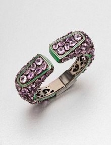A colorful piece encrusted with faceted amethyst stones set in rhodium-plated sterling silver and accented with bright enamel. AmethystEnamelRhodium-plated sterling silverDiameter, about 2.2Hinged closureImported A colorful piece encrusted with faceted amethyst stones set in rhodium-plated sterling silver and accented with bright enamel. AmethystEnamelRhodium-plated sterling silverDiameter, about 2.2Hinged closureImported