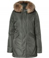 Detailed with a soft surface sheen and luxe raccoon fur trim, Woolrichs Arctic down parka is a must for contemporary cool weather looks - Hood with raccoon fur trim, long sleeves, fitted ribbed knit cuffs, hidden two-way front zip, button placket with snaps at hemline, buttoned front flap pockets - Contemporary fit, slight A-line silhouette - A versatile, classic coat perfect for both city streets and country slopes