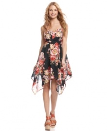 Be pretty in print with this American Rag dress that boasts gorgeous flowers everywhere and a flowy handkerchief hem! Be pretty in print with this American Rag dress that boasts gorgeous flowers everywhere and a flowy handkerchief hem!