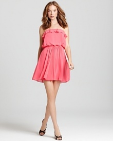 Femme ruffles at the neckline lend a flirtatious air to this Aqua strapless dress, making it a party-perfect style. Femme ruffles at the neckline lend a flirtatious air to this Aqua strapless dress, making it a party-perfect style.