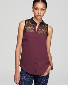 At once elegant and edgy, this Aqua blouse is the perfect desk-to-dinner choice, elevating staple black pants and distressed denim alike. At once elegant and edgy, this Aqua blouse is the perfect desk-to-dinner choice, elevating staple black pants and distressed denim alike.