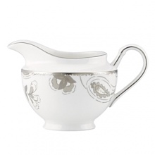 A soft floral motif exquisitely adorns Lenox's Paisley Terrace white-bodied porcelain creamer. Mica accents and gleaming platinum trim complete the traditional-modern look.