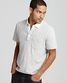 In this casual cool striped polo, rendered in soft, slubby cotton for a textured feel, you'll strike a handsome pose no matter where you go.