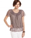 Ruffled tiers of lace add romantic charm to this top from Style&co. Easy and elegant, it's a great option for a date night!
