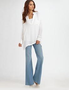 Exquisite silk with long dolman sleeves and an ultra-low v-neck. Deep v-neckSingle patch pocketLong dolman sleevesButtoned cuffsSplit hi-low hemSilkDry cleanImported Exquisite silk with long dolman sleeves and an ultra-low v-neck. Deep v-neckSingle patch pocketLong dolman sleevesButtoned cuffsSplit hi-low hemSilkDry cleanImported